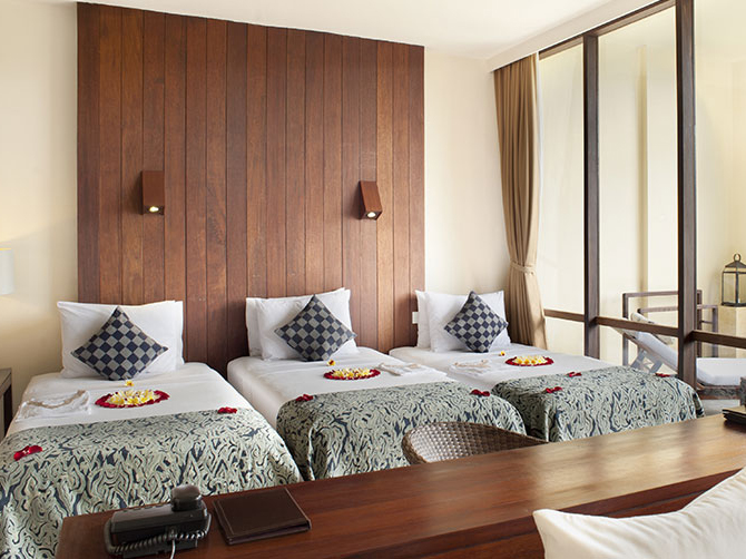 Komaneka Bisma-Suite Triple Room